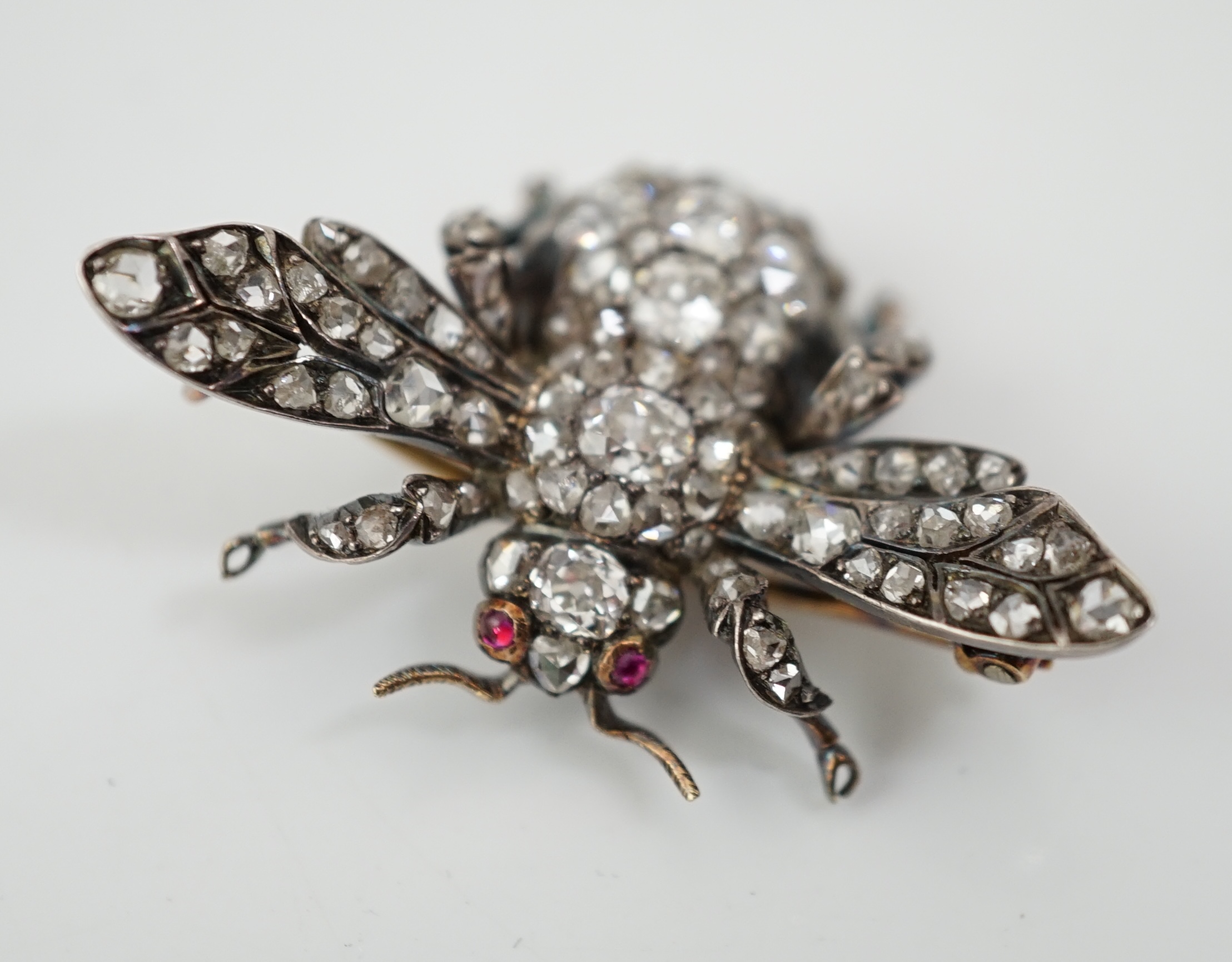 A Victorian gold, silver and diamond encrusted bee brooch